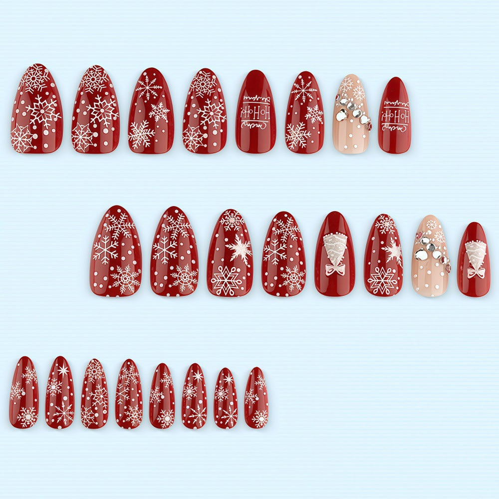 Artificial nails in festive Christmas design Bowlift