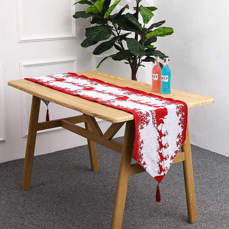 Festive table runner with reindeer motif Bowlift