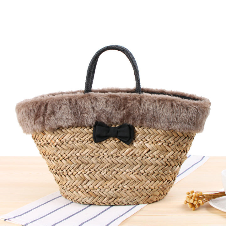 Braided handbag with luxurious faux fur trim Bowlift