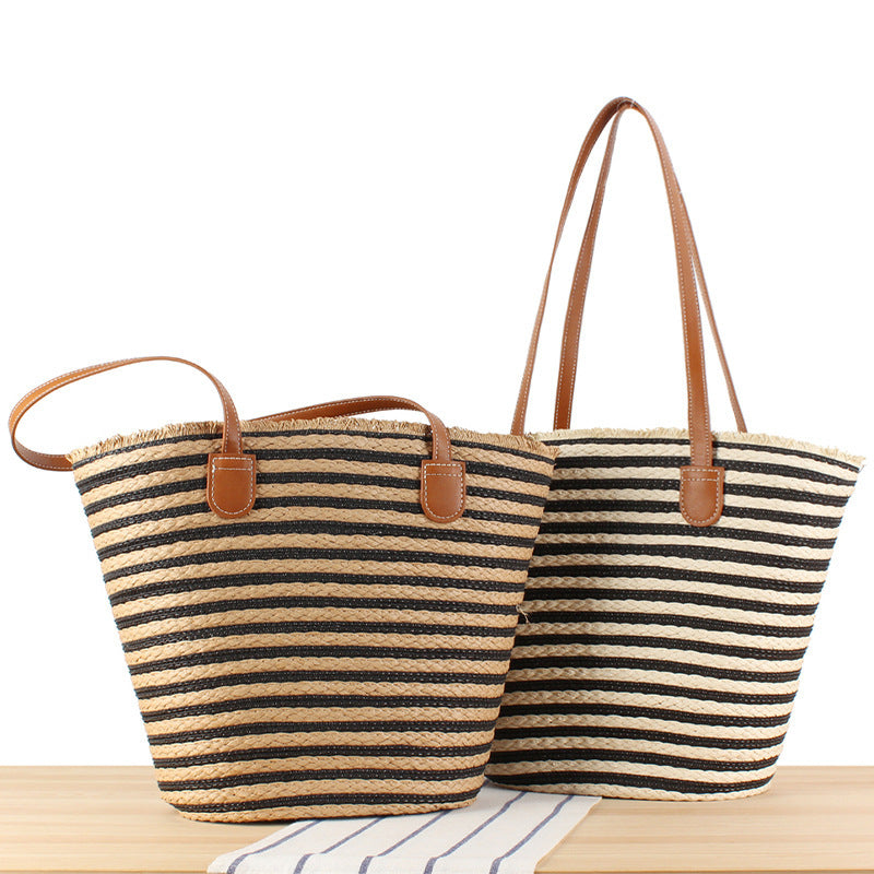 Braided beach bag with modern stripes and sturdy handles Bowlift