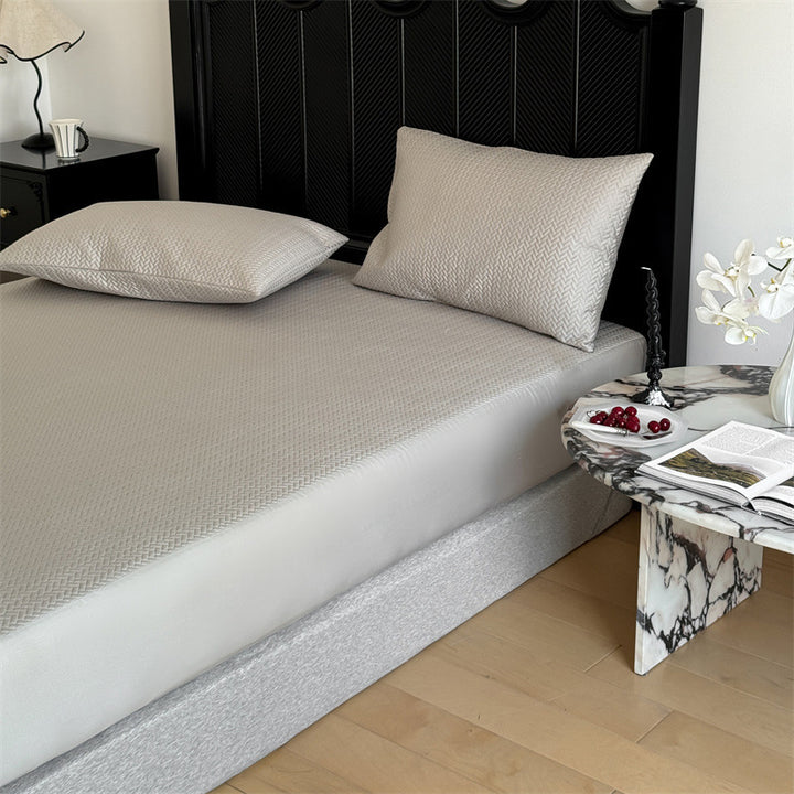 Comfort mattress topper with textured waffle surface and deep edge
