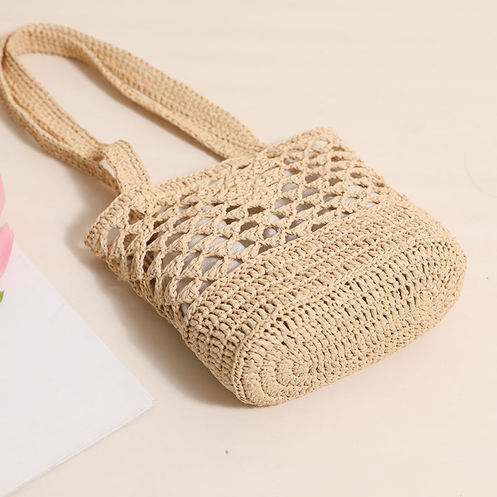 Handcrafted net straw bag with elegant straps Bowlift
