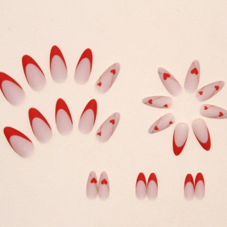 Heart-Embellished Stiletto Nail Art Bowlift