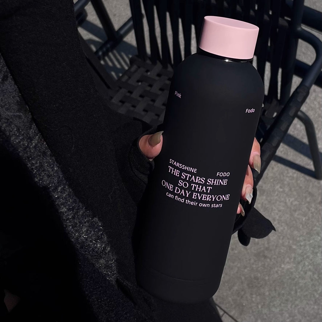 Women's insulated bottle with ergonomic design and practical carrying strap Bowlift