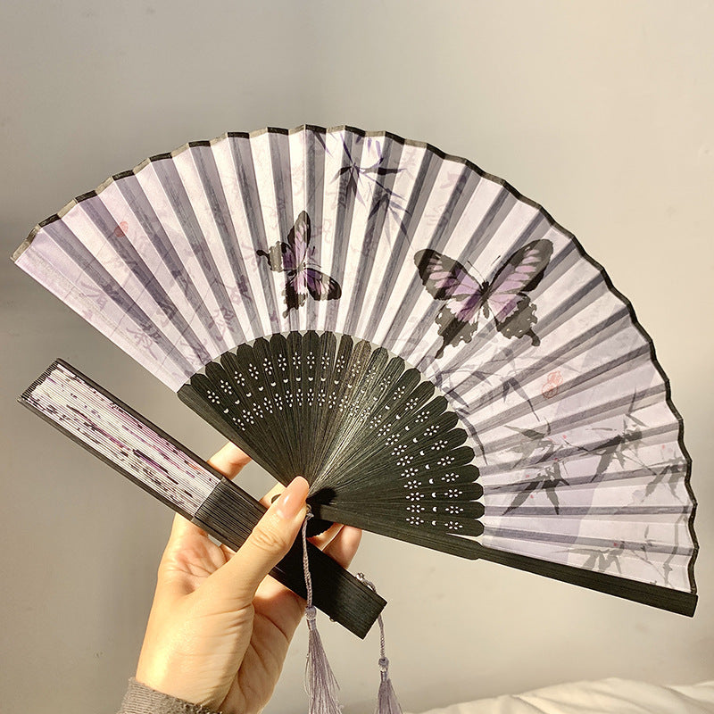 Elegant fan with elaborate butterfly motif Bowlift