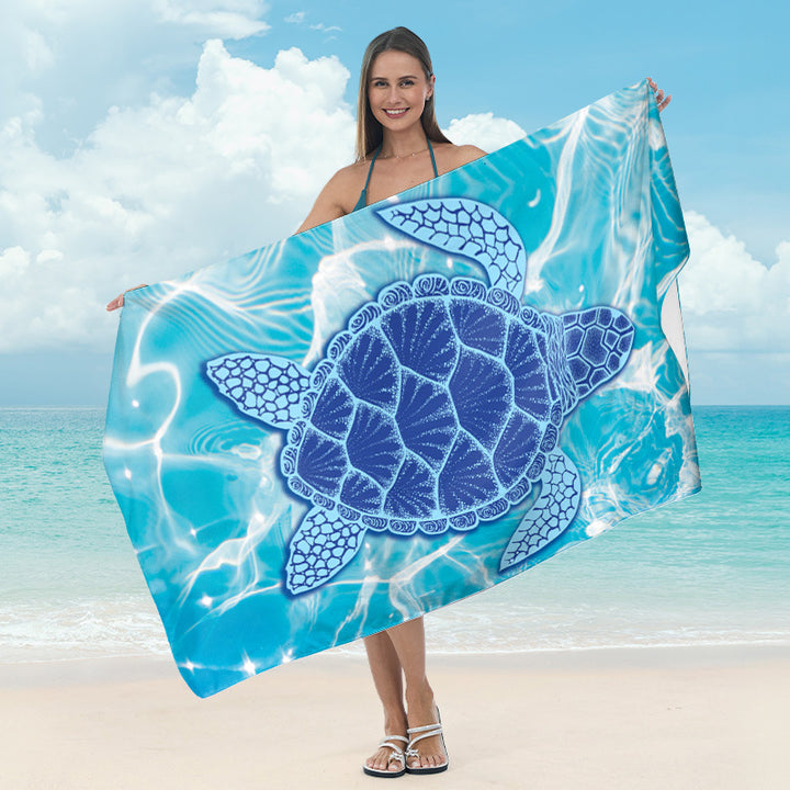 Beach blanket with tropical leaf design Bowlift