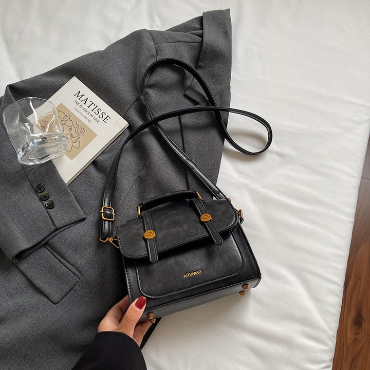 Compact Leather Handbag Bowlift
