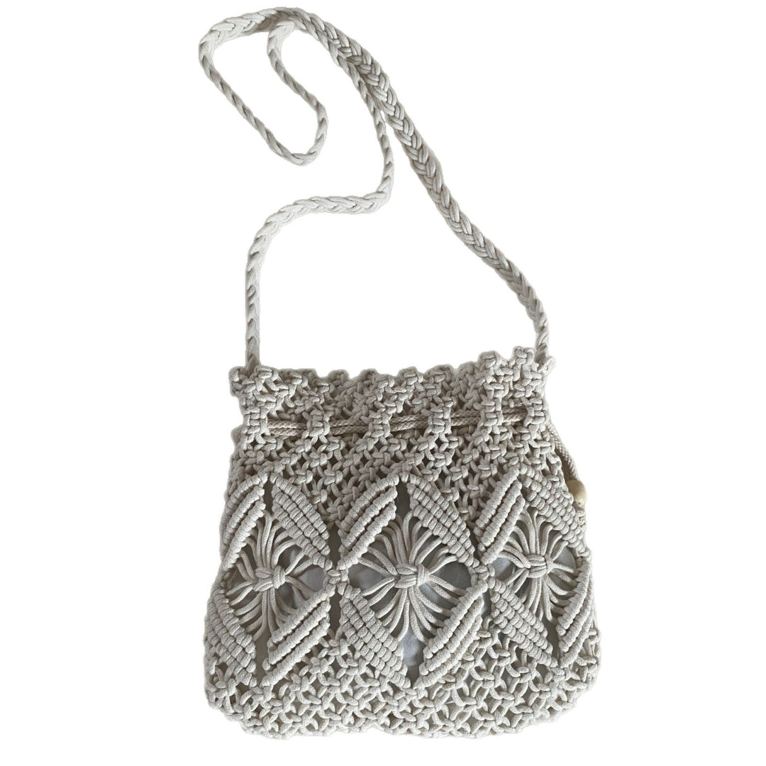 Hand-knotted shoulder bag with floral details Bowlift