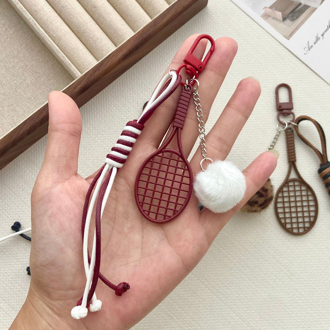 Tennis Racket and Fur Ball Keychain Bowlift