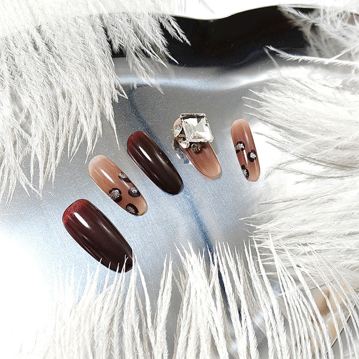Luxury artificial nails with elegant rhinestone applications Bowlift