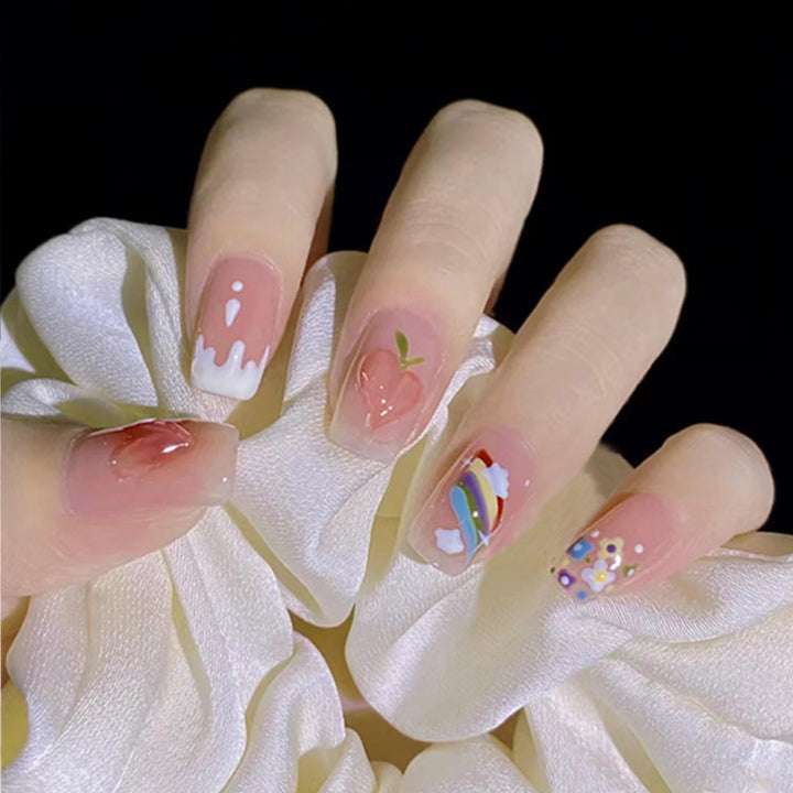 Decorative Nail Art with Fruit and Pastel Designs