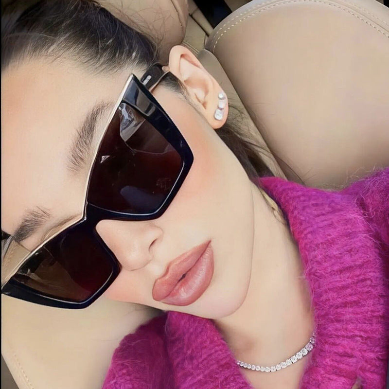 Women extravagant sunglasses with unique design and golden accents Bowlift