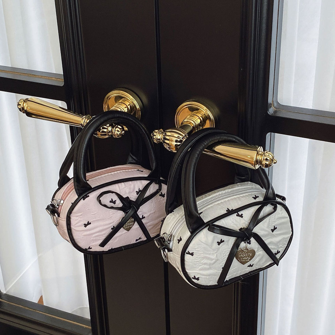 Quilted Mini Handbag with Heart Detail Bowlift