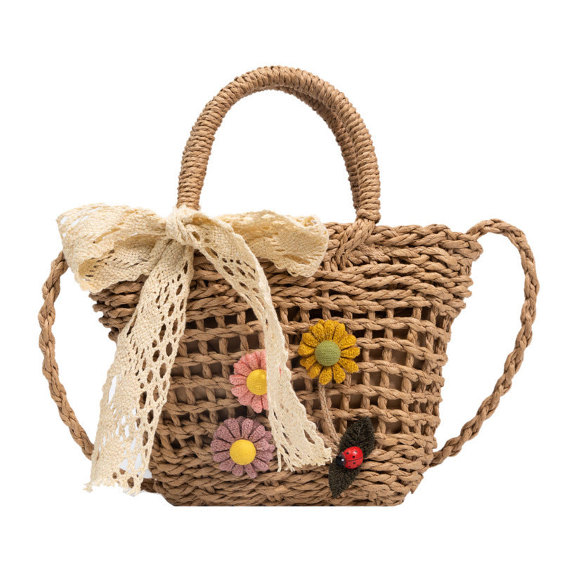 Playful basket bag with floral accents Bowlift