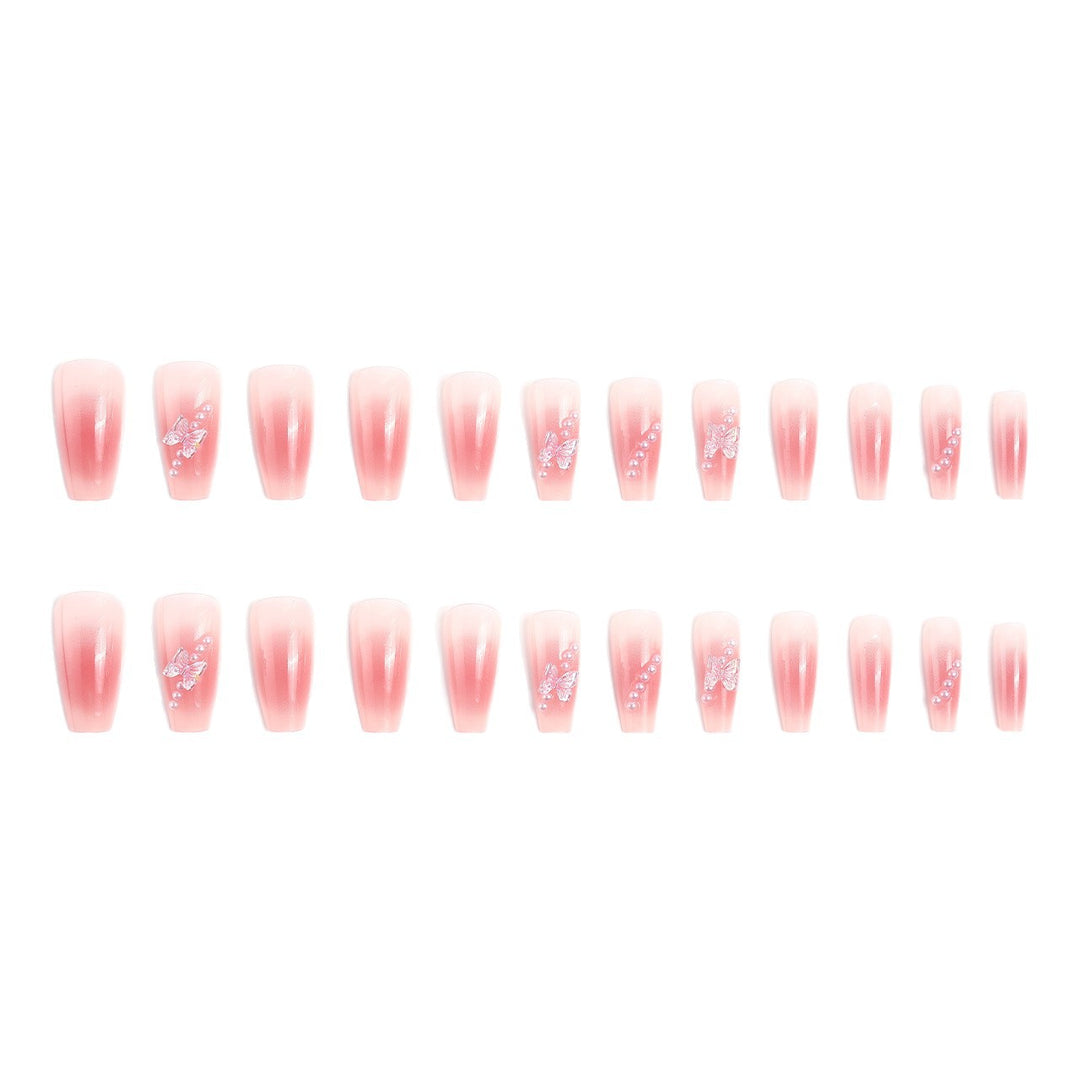 Artificial nails with luxurious pearl and glitter decorations Bowlift