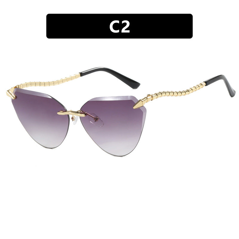 Women's Cat-Eye Sunglasses with unique gold frame design and protective lenses Bowlift