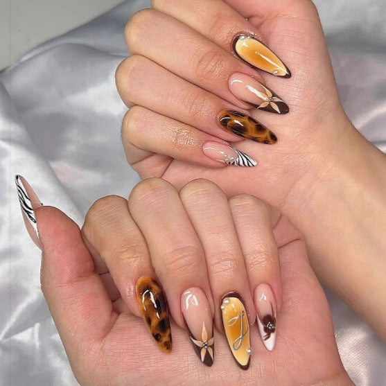 Artificial nails with elegant droplet and animal designs Bowlift