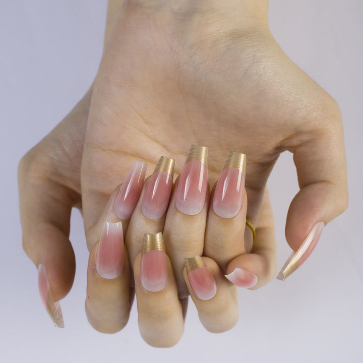 Acrylic Nail Set with Elegant Ombre Design and Golden Accents Bowlift