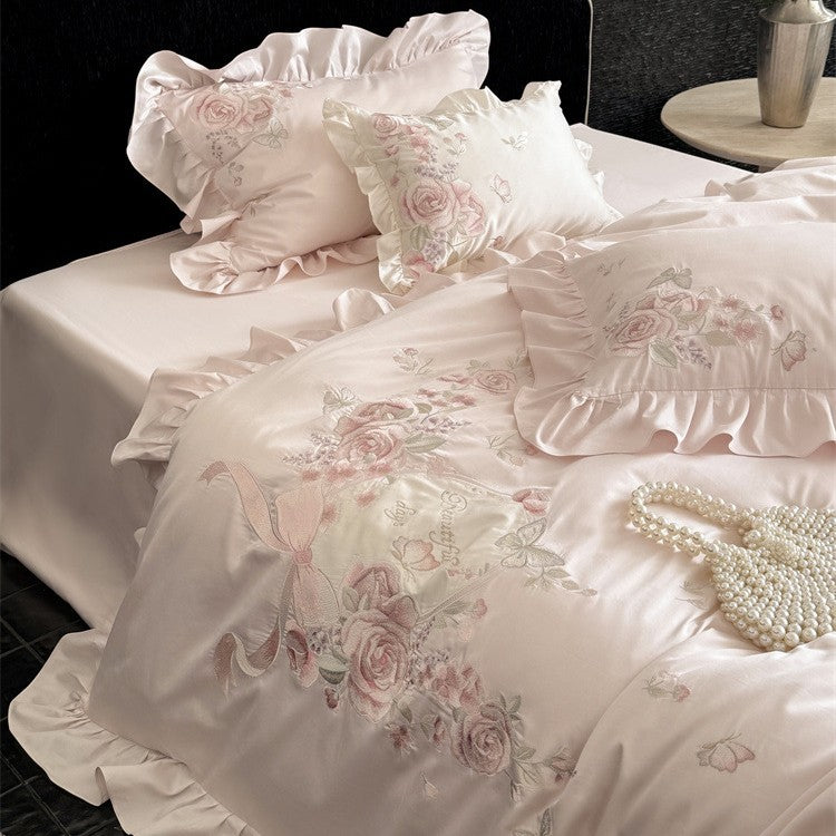 Luxurious satin bedding set with floral embroidery, ruffled edge and silky-matte finish Bowlift