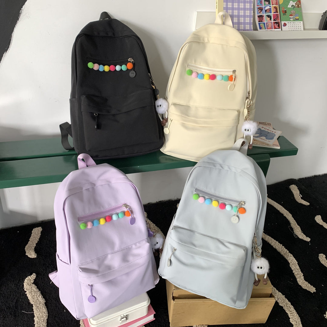 Practical backpack with colorful applications Bowlift