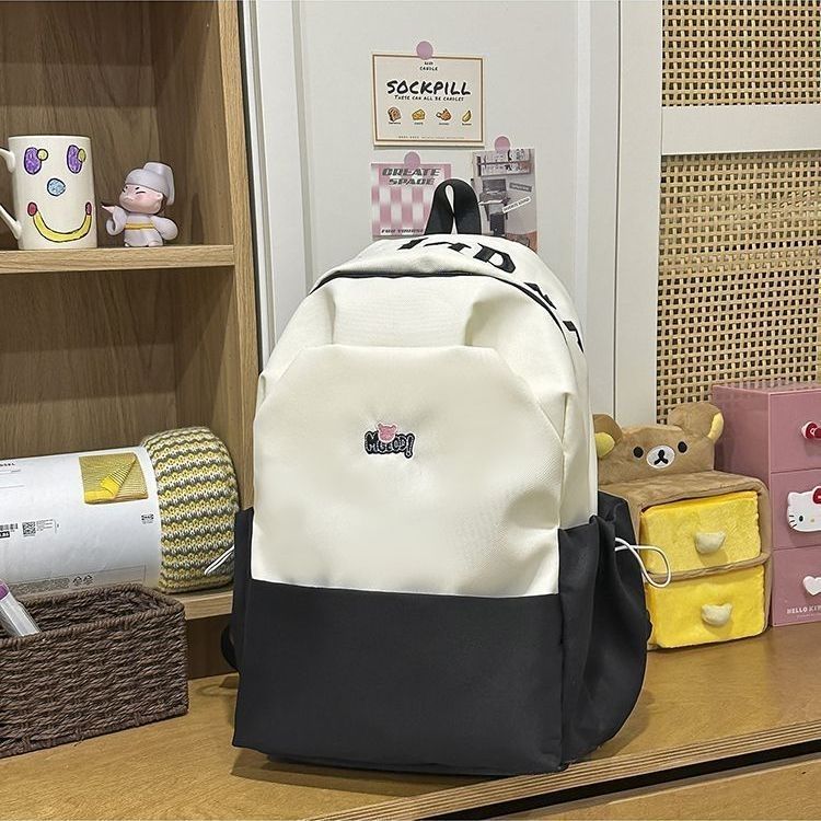 Playful backpack with embroidered Bowlift motif
