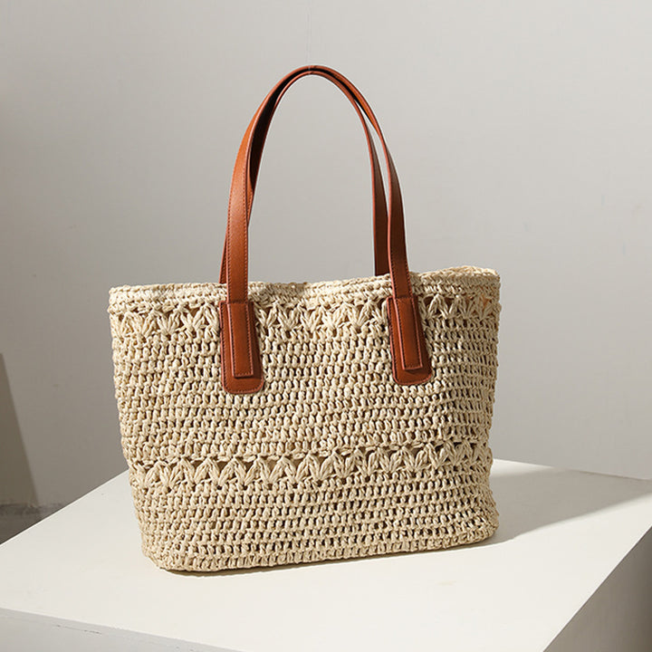 Braided straw bag with sturdy leather handles Bowlift