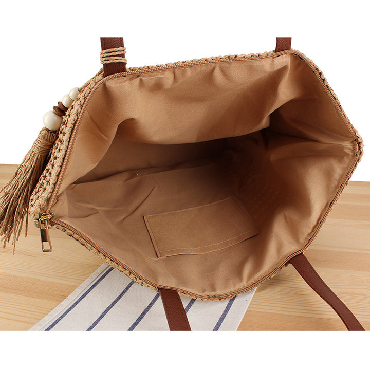 Handbag Made of Braided Natural Material with Tassel Decoration Bowlift