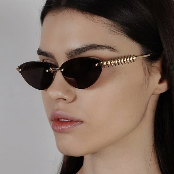 Women's sunglasses in modern, geometric design with stylish metal frame and UV protection Bowlift
