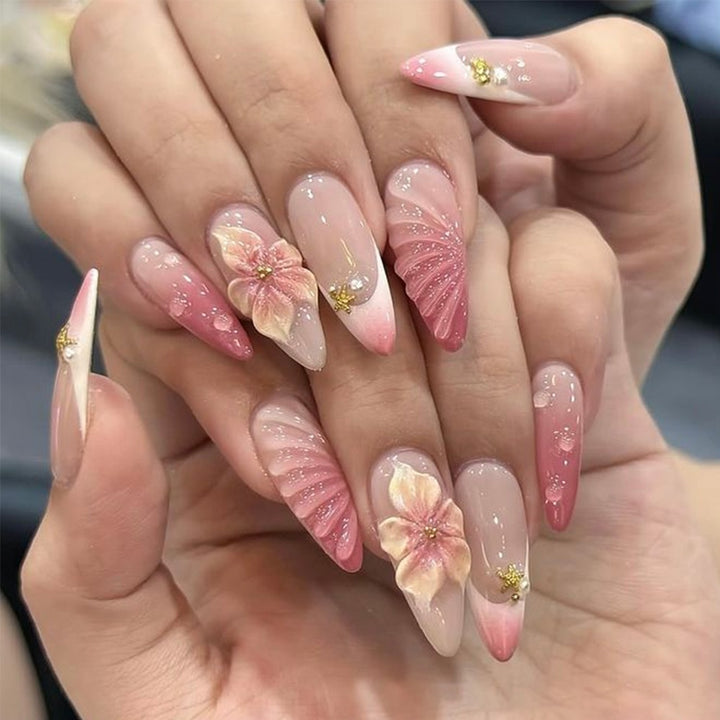 Artificial nails with flower and glitter accents Bowlift