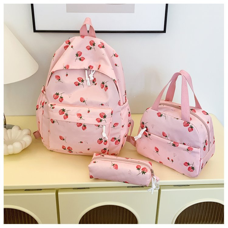 Backpack set with cheerful strawberry pattern and practical compartments Bowlift