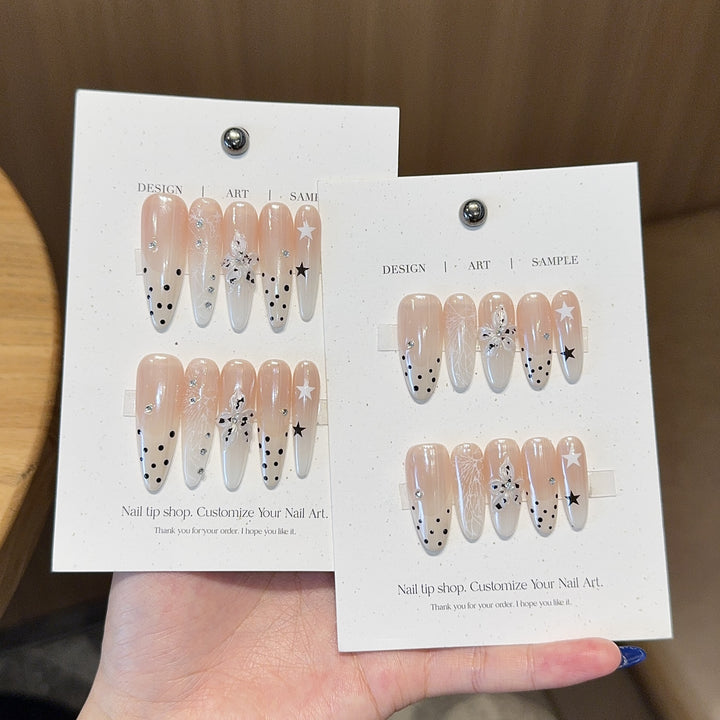 Acrylic Nails Set with Creative Designs and Shimmering Accents Bowlift