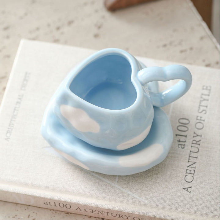 Heart-shaped ceramic cup set with saucer