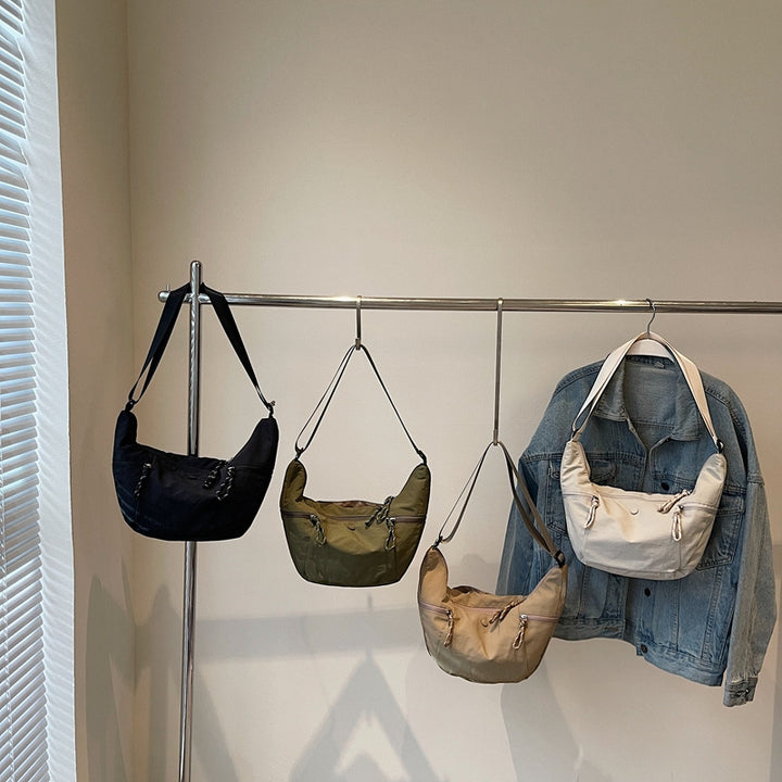 Practical shoulder bag with external zip pockets Bowlift