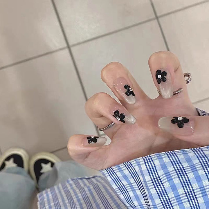 Artificial nails with elegant floral decorations Bowlift