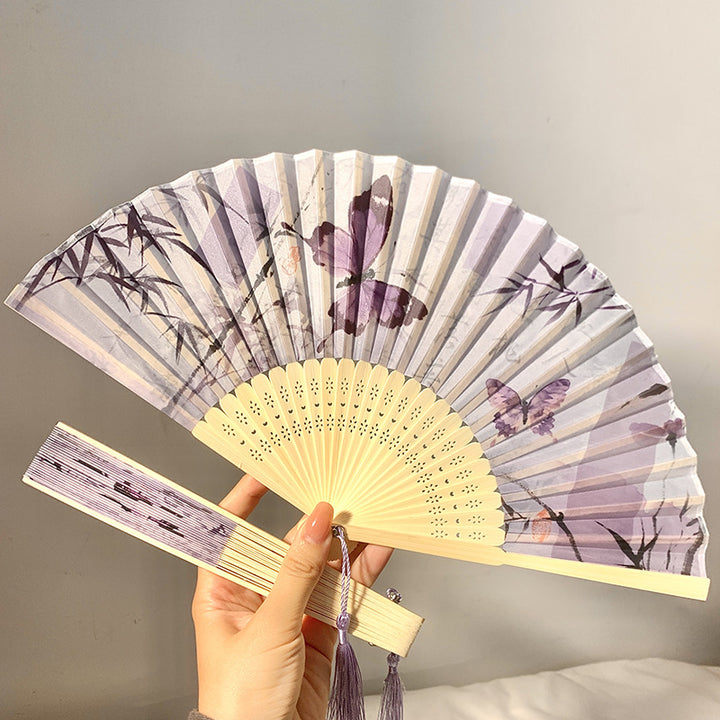 Elegant fan with elaborate butterfly motif Bowlift