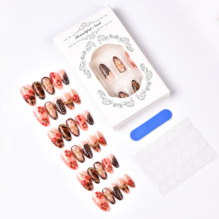 High-quality artificial nail creation with floral decorations Bowlift