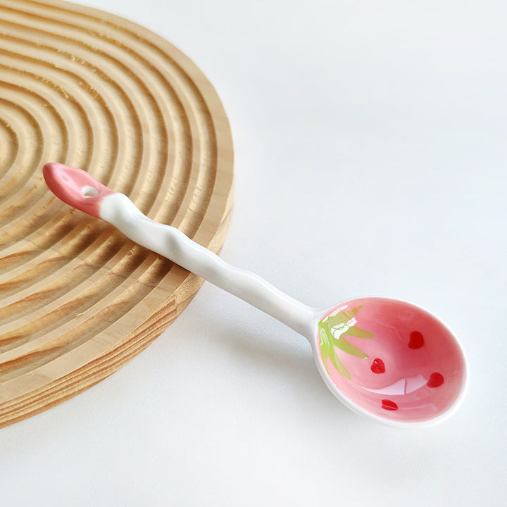 Ceramic soup spoon with lucky cat illustration and ergonomic long-handle Bowlift