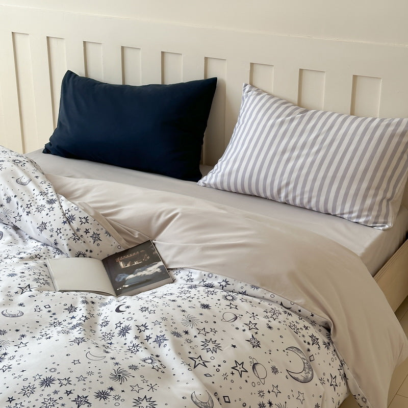 Reversible bedding set made of cotton blend with polka dot pattern and minimalist animal illustration