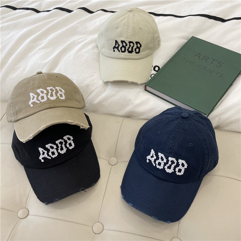 Women's Distressed Cotton Baseball Cap with Graphic Detailing Bowlift