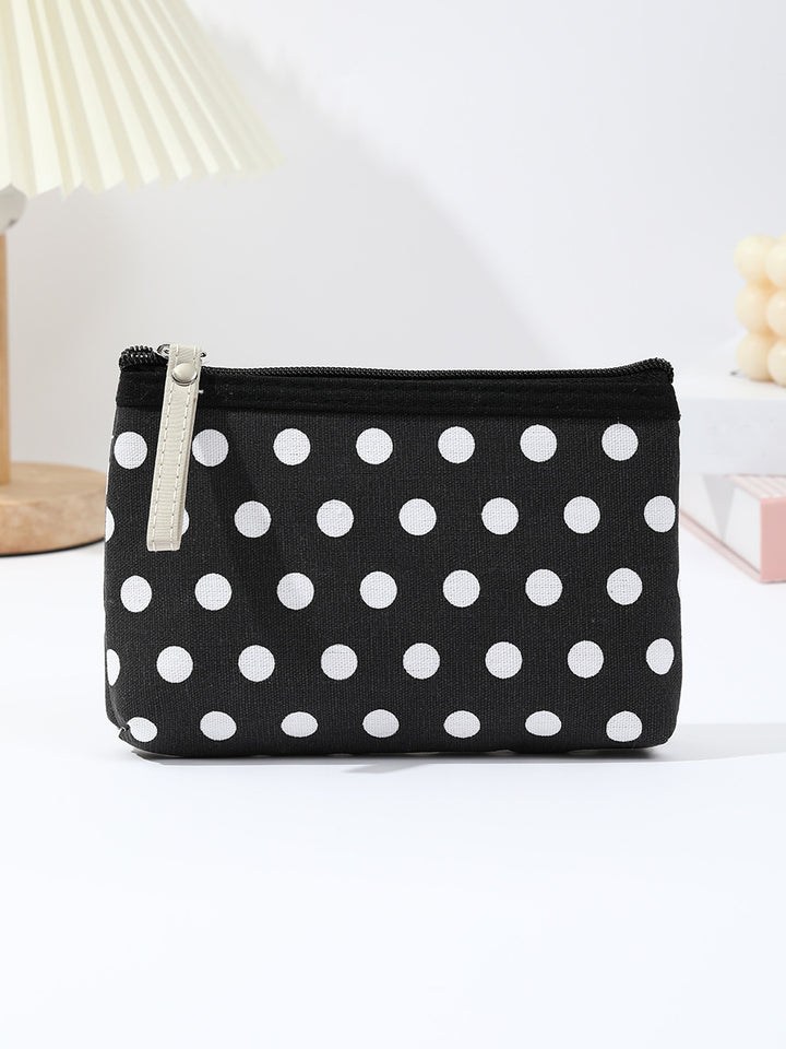 Polka dot canvas cosmetic pouch with top zipper and leather pull Bowlift