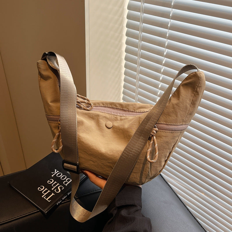 Practical shoulder bag with external zip pockets Bowlift