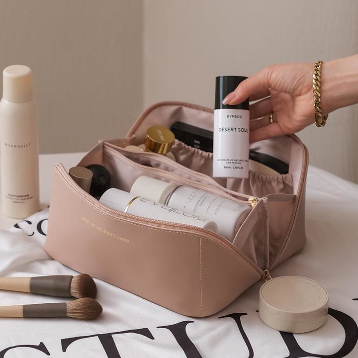 Cosmetic bag with multiple compartments and elegant design Bowlift