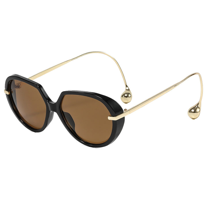 Women's Cat-Eye Sunglasses with Golden Accents and Stylish Frame Bowlift