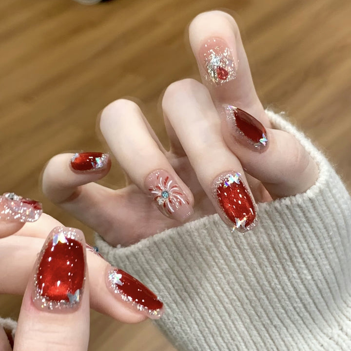 Artistic Press-On Nail Set with Glitter and Star Accents Bowlift