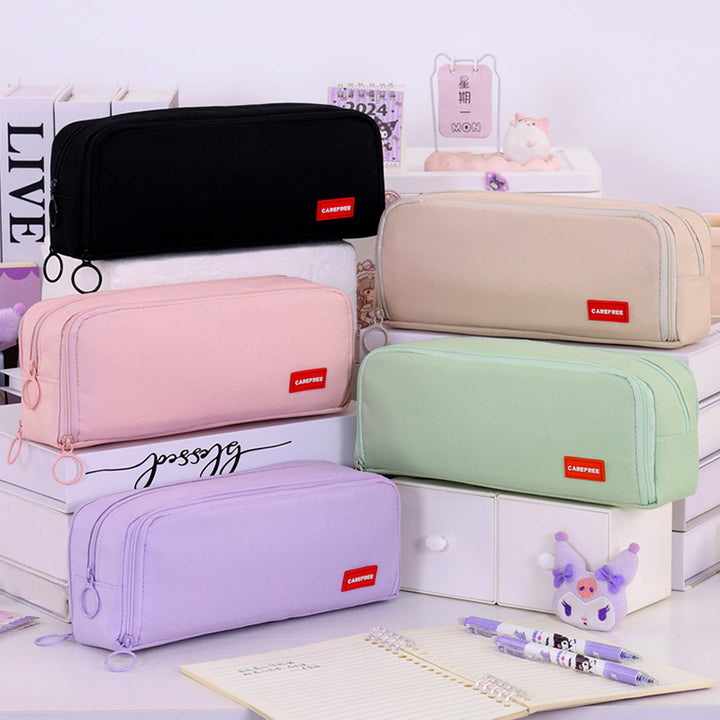Pencil case with double zipper and variable compartment arrangement Bowlift
