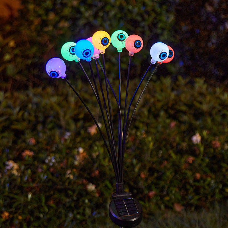 Creepy garden lights with eye motif Bowlift