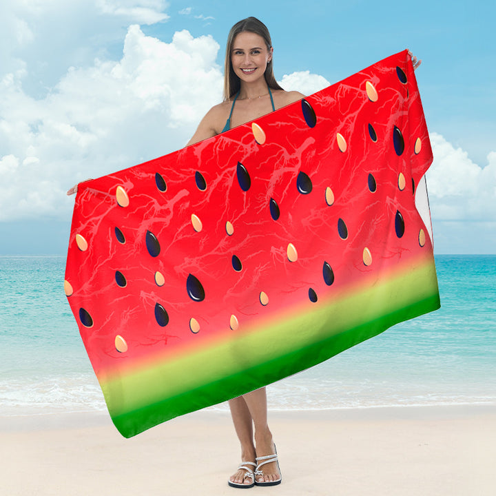 Beach towel with tropical leaf design Bowlift