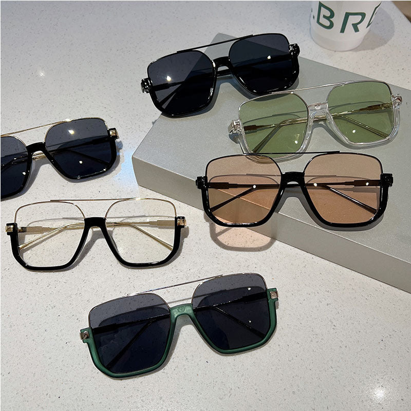 Women's square sunglasses with transparent frame and green tinted lenses Bowlift