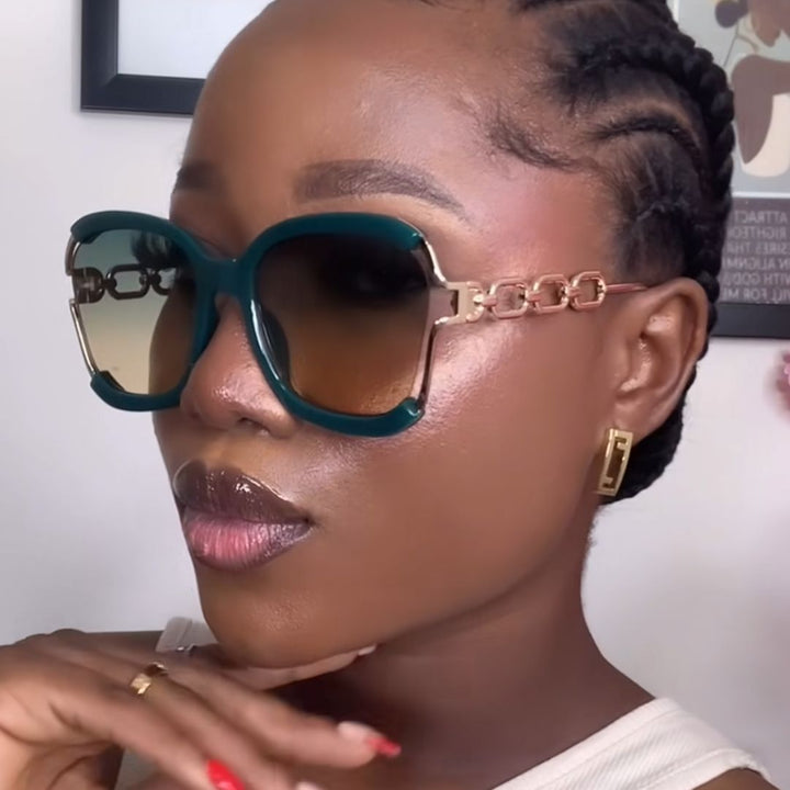 Ladies fashionable sunglasses with golden chain details Bowlift