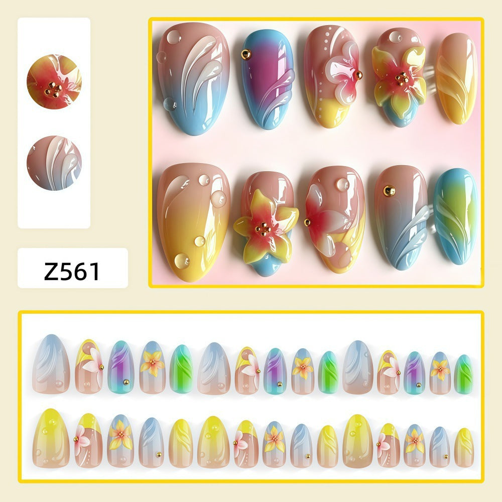 Acrylic nail set with floral elements and colorful accents Bowlift